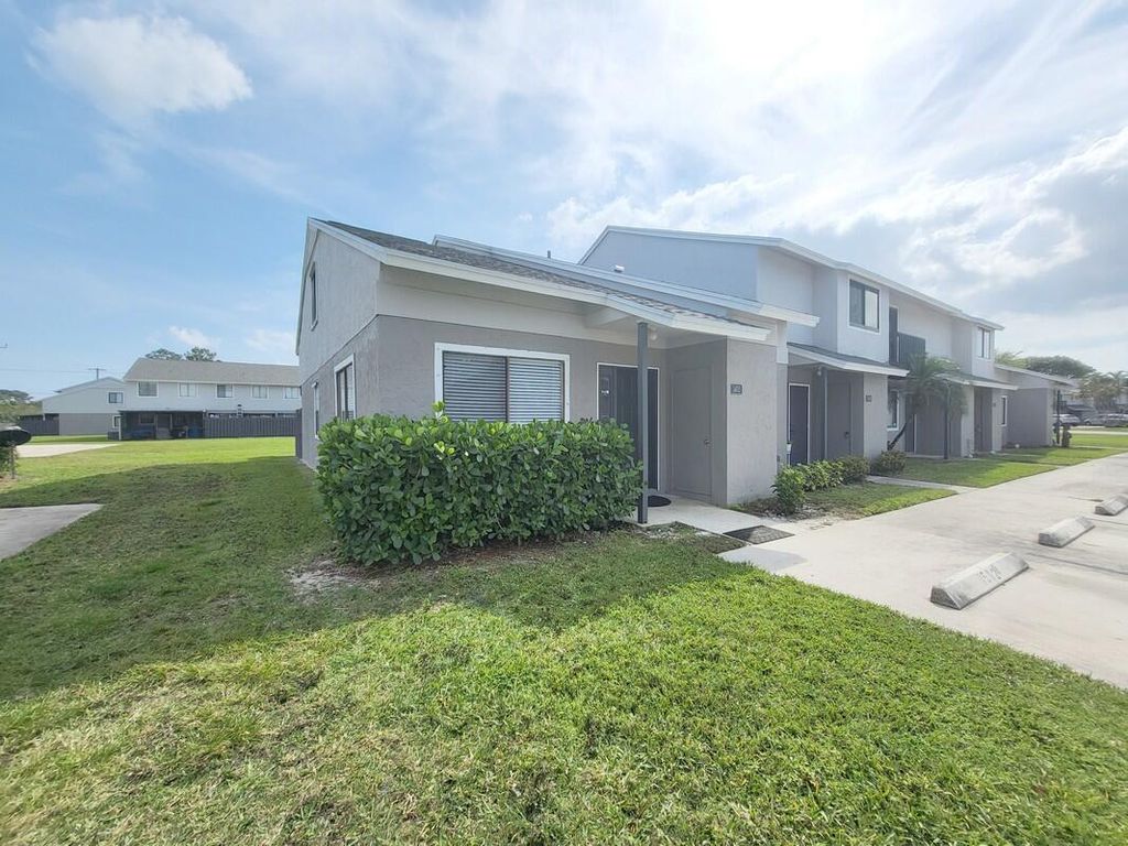Photo of 1405 Wharf Lane, Greenacres, FL 33463 (MLS # R10974764)
