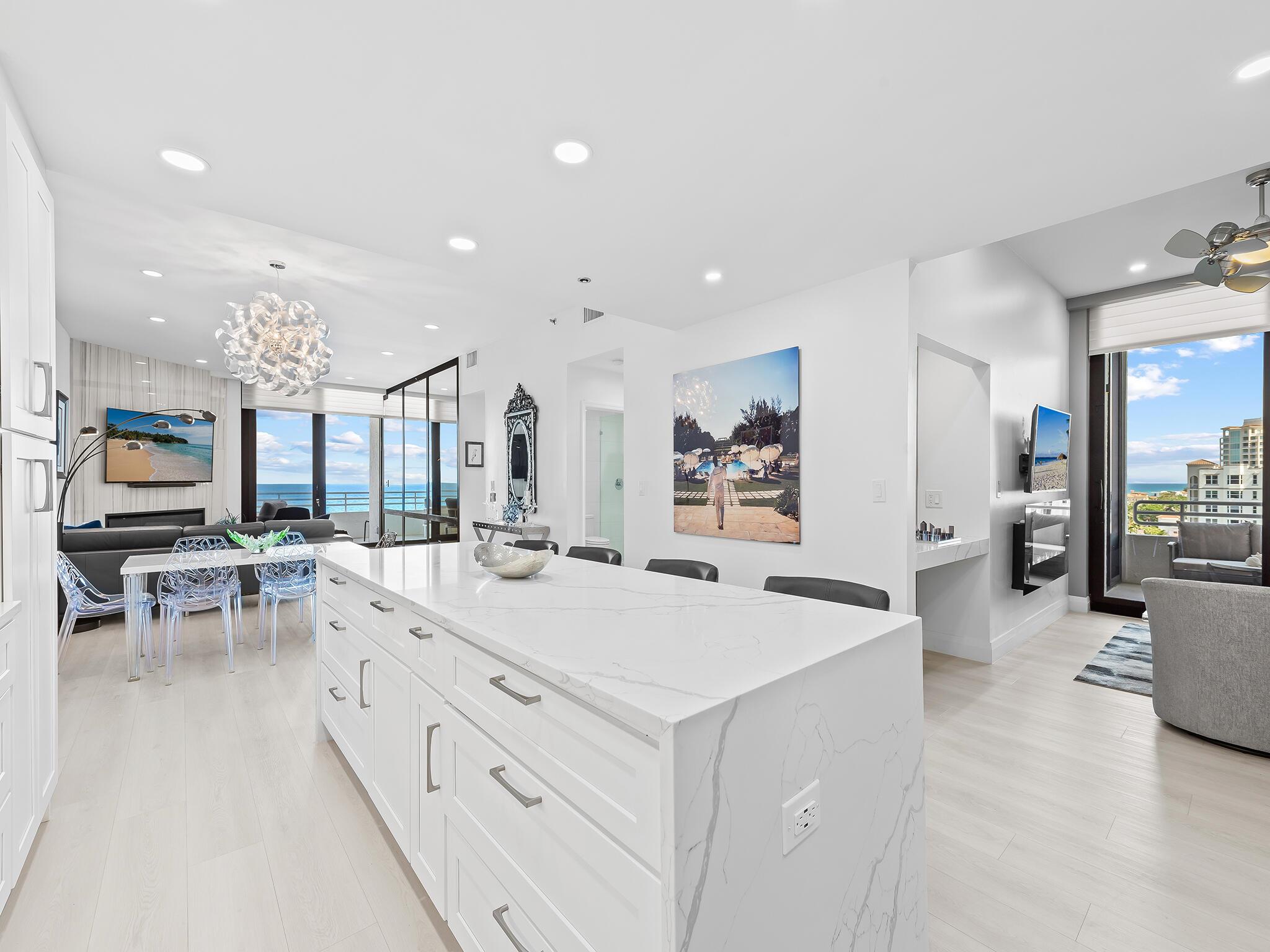 Unobstructed Ocean Views from this totally redesigned turnkey Lower Penthouse residence! This beautiful South East corner 2-Bed, 2-Bath, features an open light-filled floor plan with high ceilings and water views from every room, open kitchen island, S/S appliances, all impact sliding doors and windows, walk in closets, expansive private covered balconies for an outdoor retreat showcasing fabulous ocean, city & sunrises views! Casuarina has a renovated lobby, newly installed hallways, private beach access with chairs waiting at the beach, heated large pool, tennis and pickleball, 24 hr manned security, social room with kitchen, fitness center, card room, shuffleboard, BBQ area, extra storage area with A/C covered, management office and garage parking with gated access