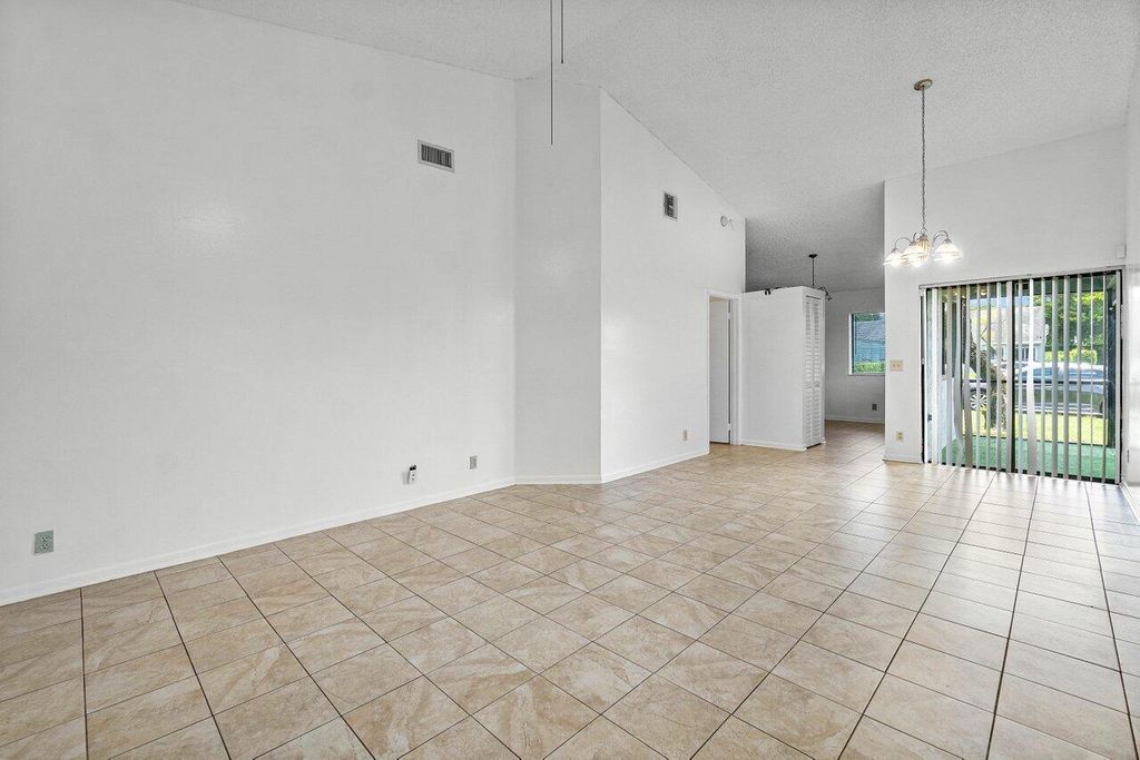 Photo of 3947 Island Club Circle W, Lake Worth, FL 33462 (MLS # R11094085)