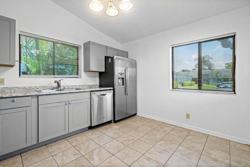 Photo of 3947 Island Club Circle W, Lake Worth, FL 33462 (MLS # R11094085)