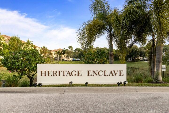 Spacious Townhouse for Rent in Heritage Enclave - Pet Friendly & Gated CommunityNestled within a private nature preserve, this beautifull townhouse is located in Heritage Enclave, a gated community of just 50 homes built with high-quality construction, including concrete walls, impact windows, and fire sprinkler systems. This pet-friendly neighborhood offers peace, privacy, and modern comfort.This two-story home features a bright and open first-floor layout with high ceilings, ceramic tile flooring, and an abundance of natural light. The main level includes a welcoming living room, dining area, a versatile space perfect for a home office or family room, a powder room, and a modern kitchen equipped with stainless steel appliances, wood cabinetry, granite countertops, and a snack bar