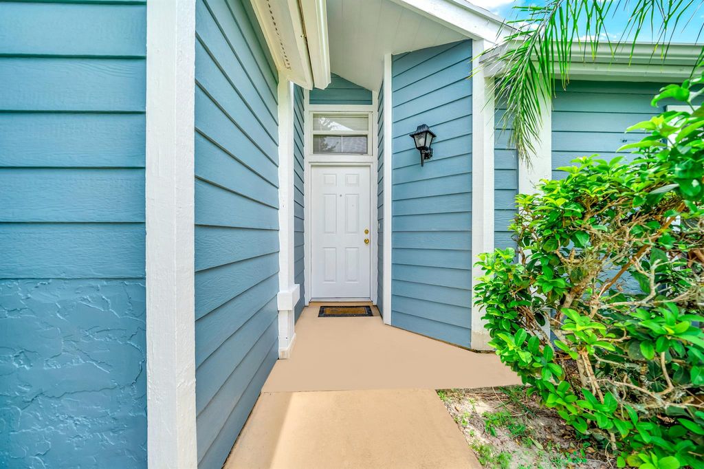 Photo of 1351 SE Airoso Boulevard, Port St Lucie, FL 34983 (MLS # R10897933)