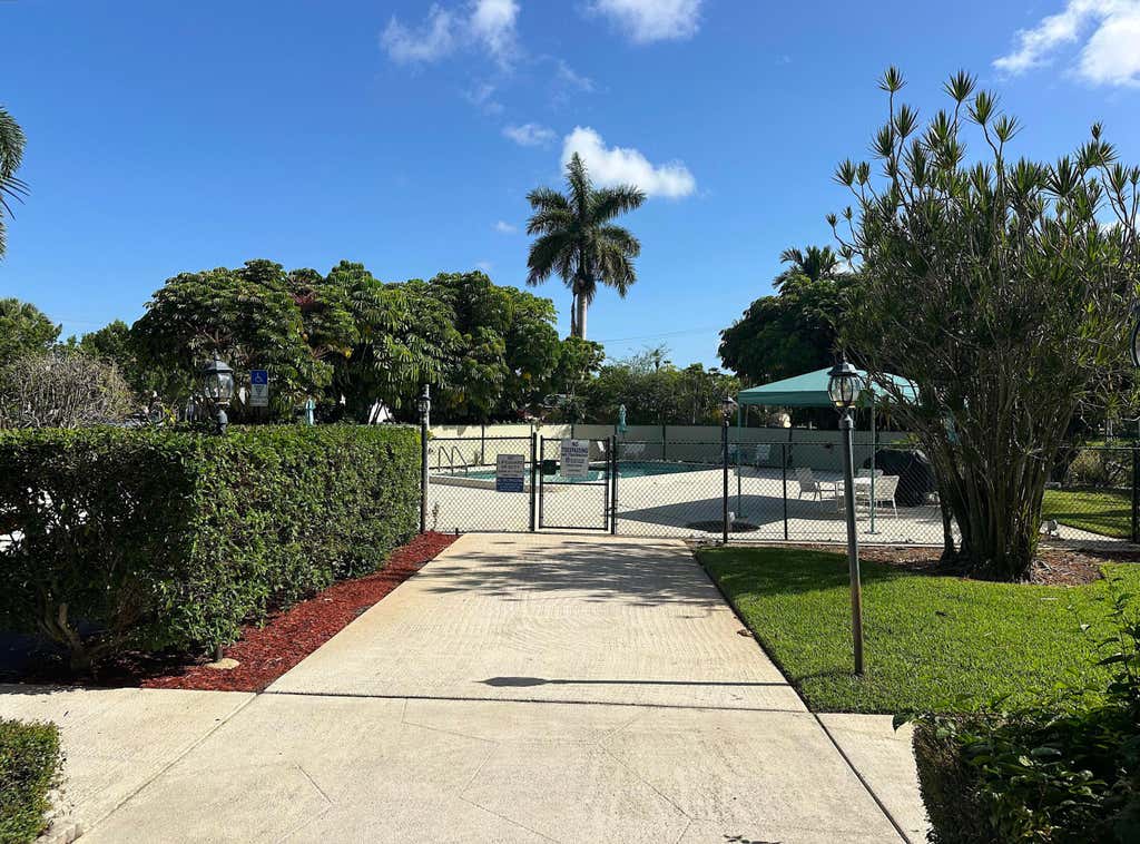 Photo of 505 Spencer Drive #407, West Palm Beach, FL 33409 (MLS # B26056562)