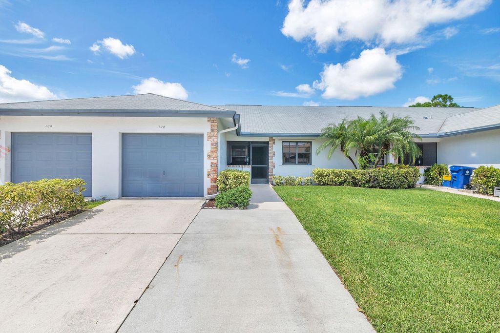 Photo of 128 Moccasin Trail S, Jupiter, FL 33458 (MLS # R10909103)