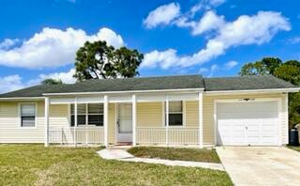 Photo of 1149 SW Coleman Avenue, Port Saint Lucie, FL 34953 (MLS # R10781807)