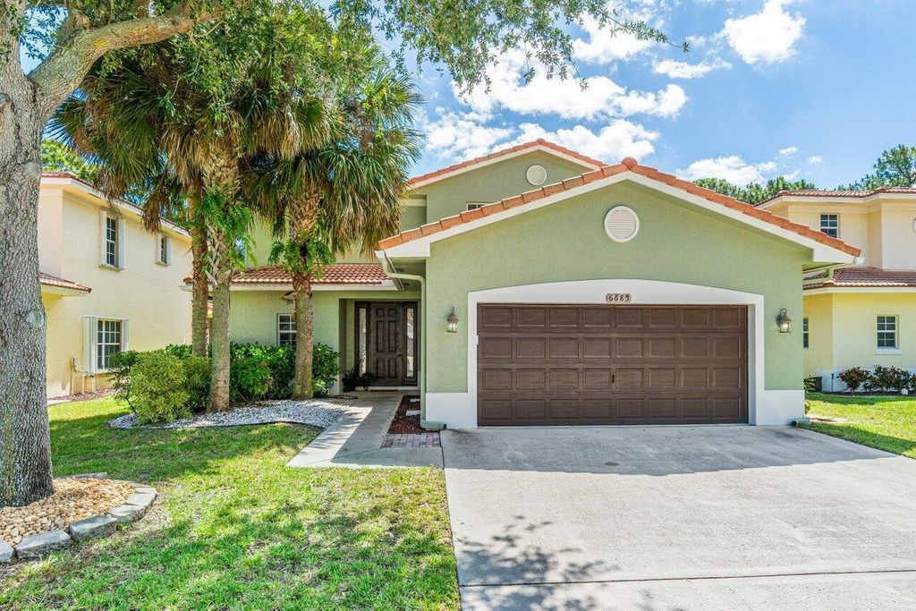 Photo of 6685 Eagle Ridge Drive, Greenacres, FL 33413 (MLS # R10900040)