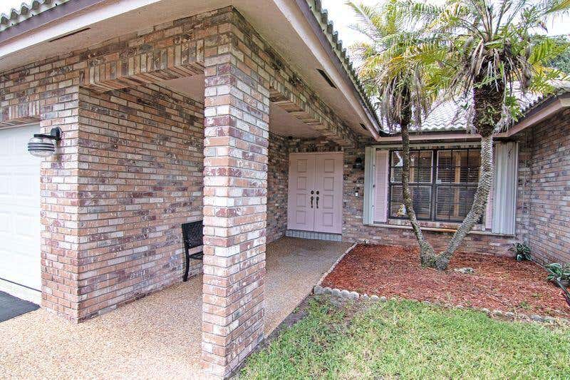 Photo of 11929 NW 2ND Manor, Coral Springs, FL 33071 (MLS # B26063812)