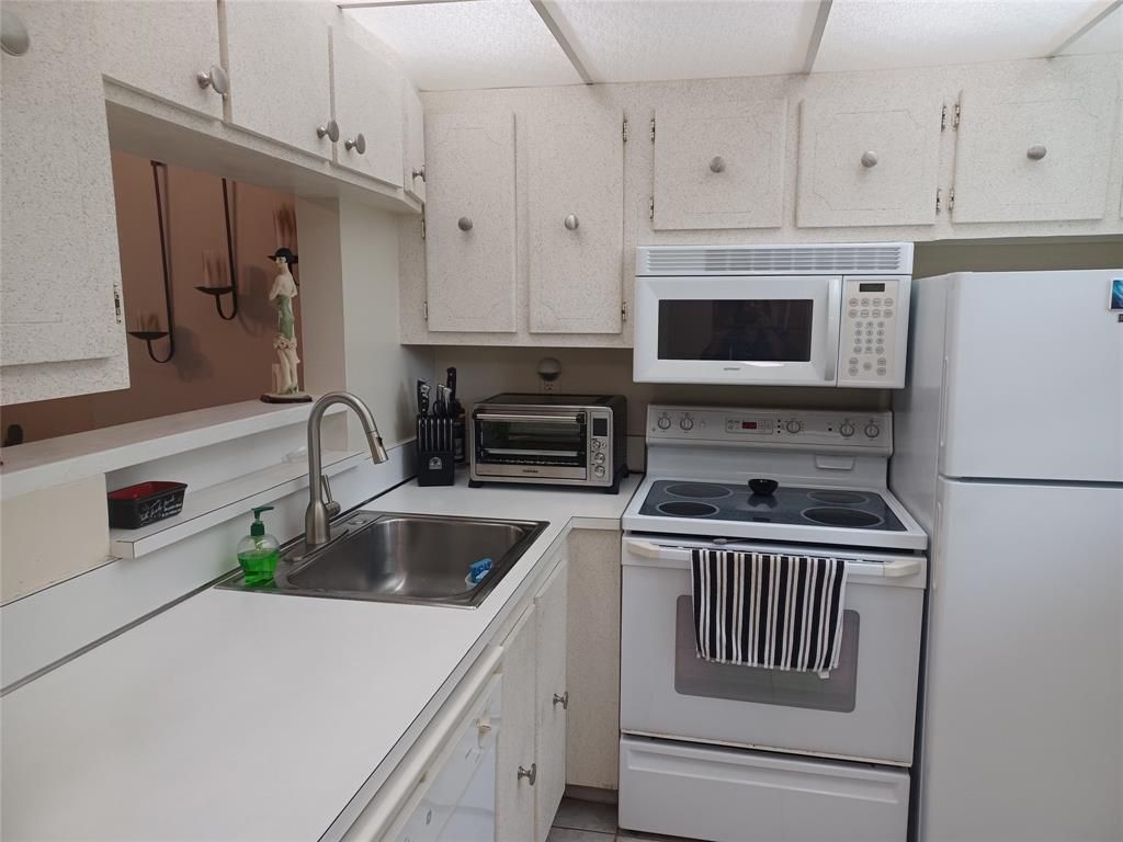 Photo of 1391 S Ocean Boulevard #105, Pompano Beach, FL 33062 (MLS # B26015713)