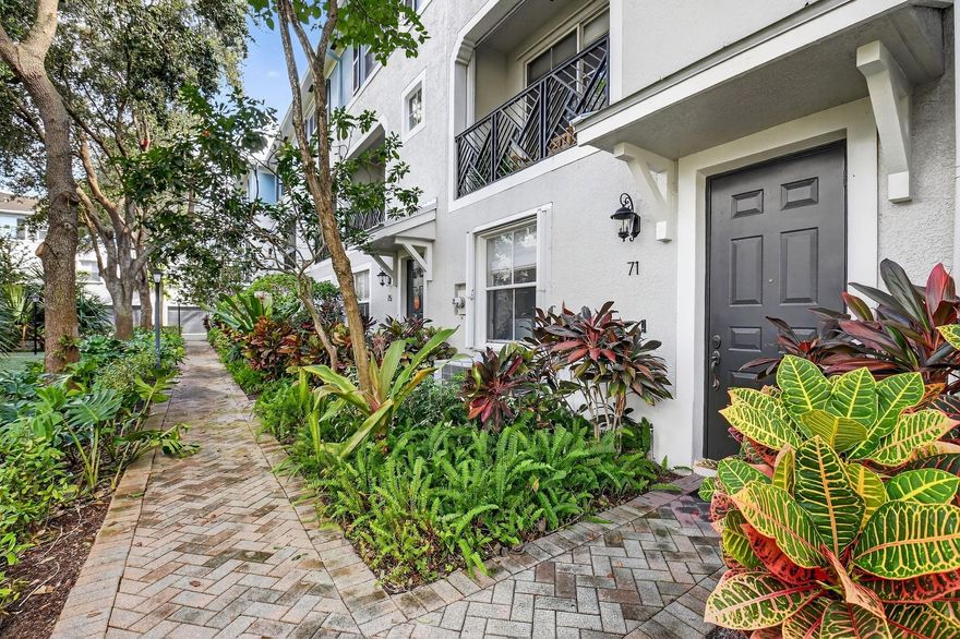 Welcome to Atlantic Grove, a private gated community just steps from vibrant Atlantic Avenue and all that downtown Delray Beach has to offer. This spacious 2-bedroom townhome includes a versatile flex room on the first floor, perfect for office, gym, or guest space. The main floor boasts an open-concept where the kitchen flows seamlessly into the bright living and dining areas. Enjoy plenty of natural light, a charming balcony surrounded by tropical landscaping, and a convenient half bath. Upstairs, you’ll find two comfortable bedrooms and well-appointed bathrooms. Residents enjoy a meticulously maintained community featuring a sparkling pool and lush common areas. Prime location! Walk to tennis and pickleball, restaurants, bars, festivals, and shops. Short distance to the beach. MUST SEE!