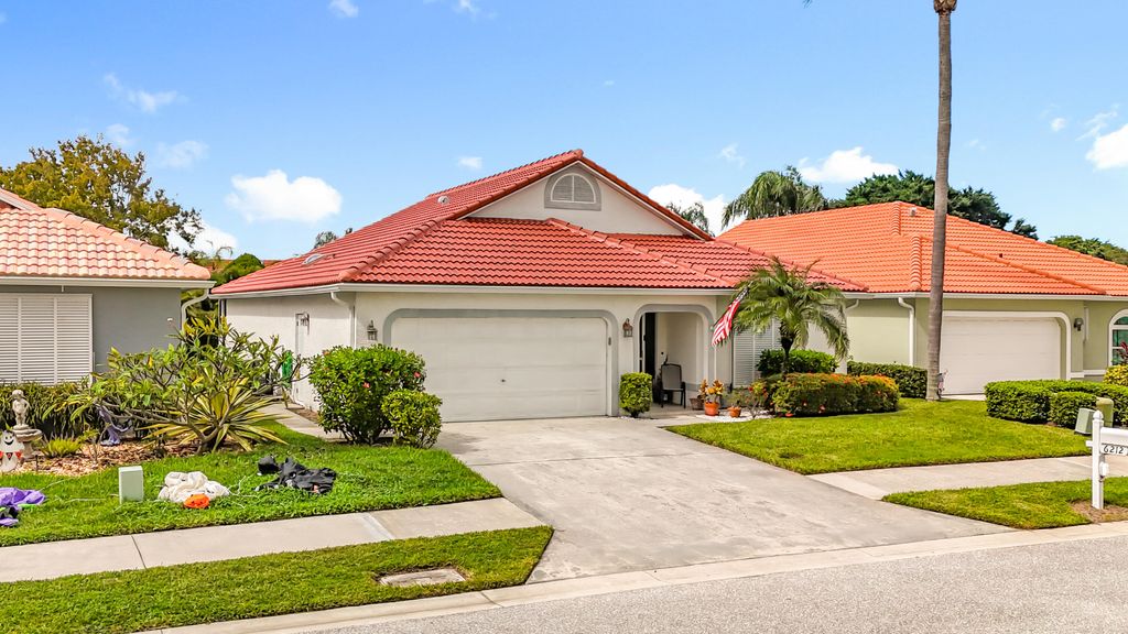 Photo of 6212 SE Windsong Lane, Stuart, FL 34997 (MLS # R11131002)