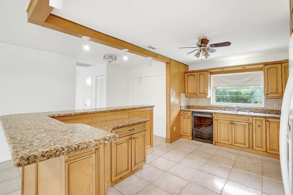 Photo of 9044 Pine Springs Drive, Boca Raton, FL 33428 (MLS # R11118294)