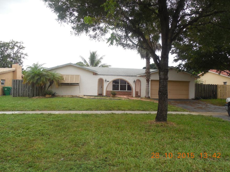 BANK OWNED PROPERTY SOLD IN AS IS CONDITION, GREAT OPPORTUNITY TO GET IN ON THE GROUND FLOOR WITH SOME SWEAT EQUITY. UPDATED KITCHEN AND APPLIANCES, SCREENED POOL WITH PRIVATE CANAL LOCATION. WALK TO ELEMENTARY AND MIDDLE SCHOOLS. HURRY THIS ONE WILL NOT LAST. CALL TODAY FOR PRIVATE SHOWING. Highest and best is due 12/10 9:00 pm your time