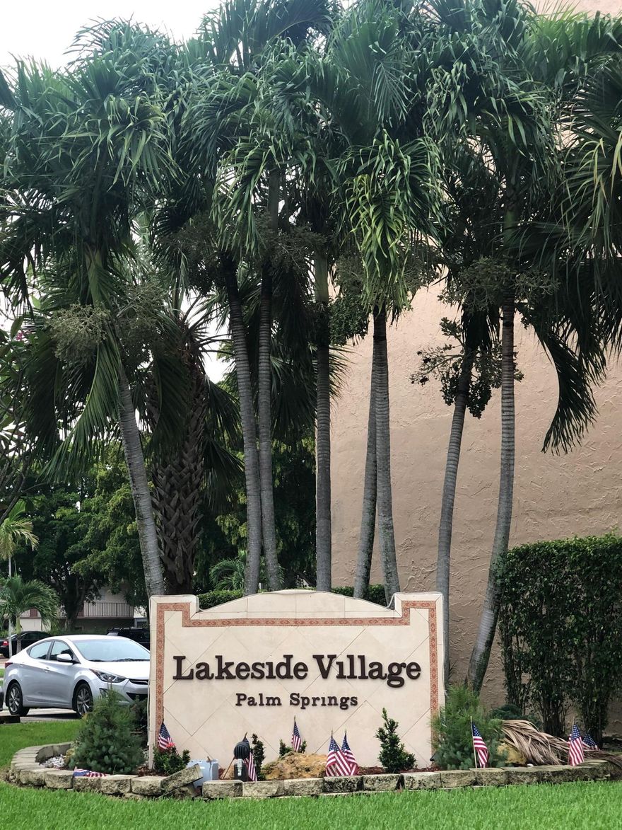 Large (Bahama model floor plan) 1 bedroom with den that can easily be used as 2nd bedroom, 1 full bathroom and 1 half bathroom. Water, Cable and internet package included. Located on the ground floor of the building with assigned parking in front of the door for easy loading/unloading convenience. Tile floors throughout. Dining area and kitchen have large windows for natural light. Screened in rear patio opens to expansive lawn and garden. Extra storage closet  in patio. Building located next to a park with lake and walking trails. Clubhouse and pool across the street for exercise facility, recreation hall, hobby rooms, billiards, mini golf and shuffleboard. Occupants must be 55 years old. No pets or smoking allowed as/ association rules.