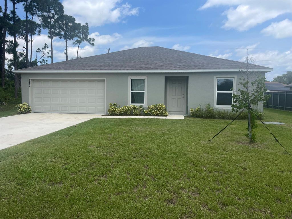 Photo of 913 SW Eureka Avenue, Port St Lucie, FL 34953 (MLS # R10901522)