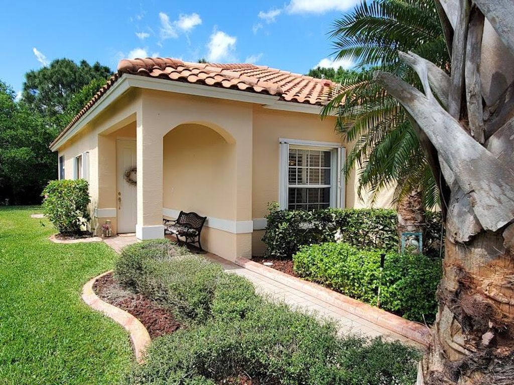 Photo of 430 NW Lismore Lane, Port Saint Lucie, FL 34986 (MLS # R10964465)