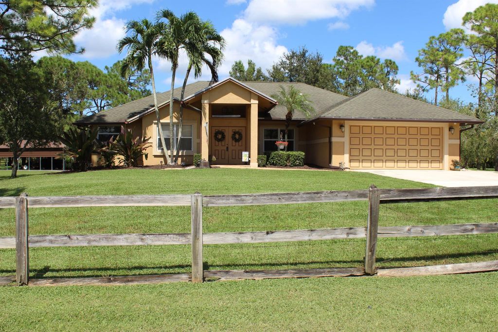 Photo of 12249 85th Road N, West Palm Beach, FL 33412 (MLS # R10922025)