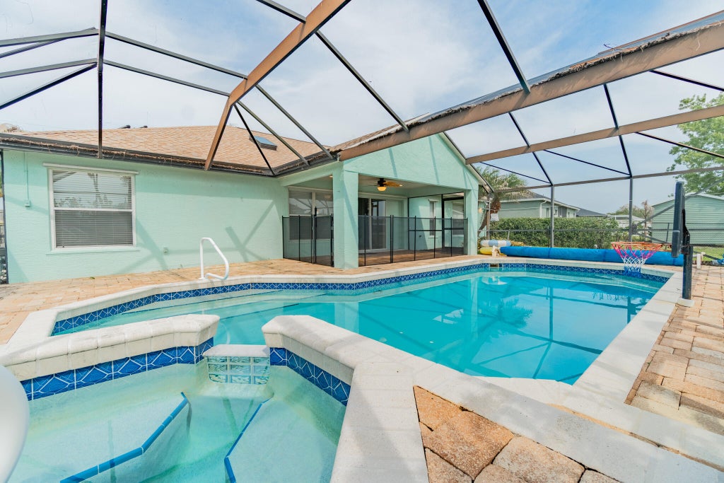 Photo of 5593 NW WESLEY Road, Port Saint Lucie, FL 34986 (MLS # B26071336)