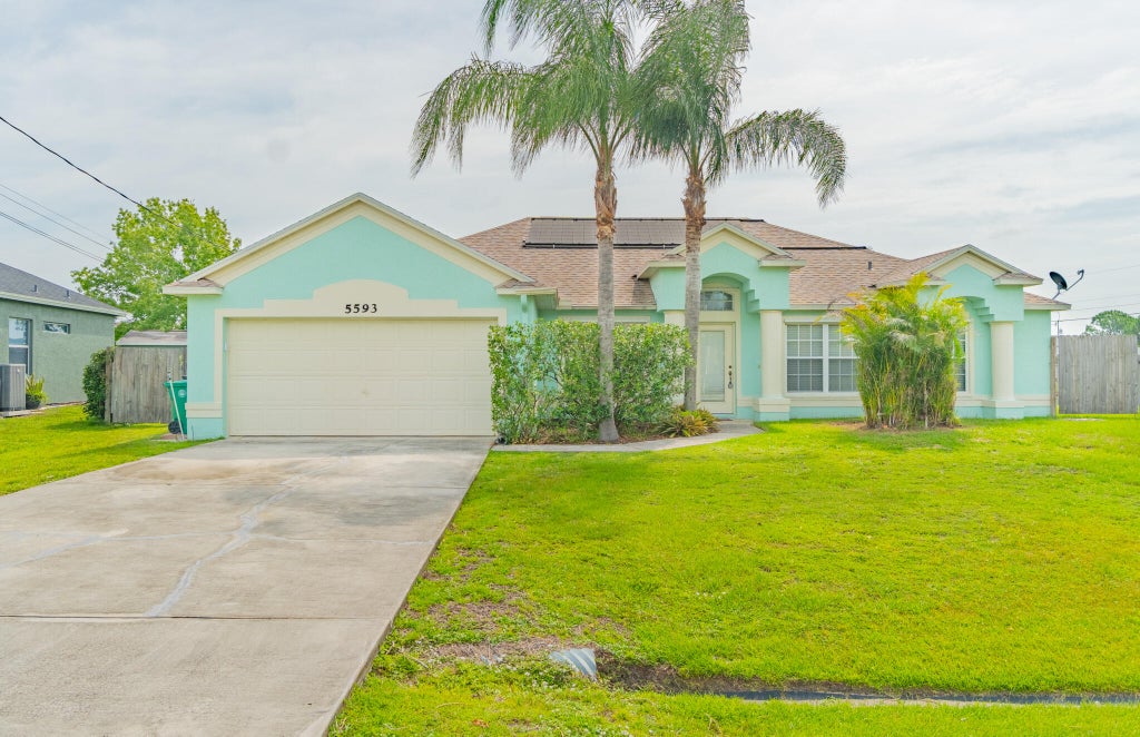 Photo of 5593 NW WESLEY Road, Port Saint Lucie, FL 34986 (MLS # B26071336)