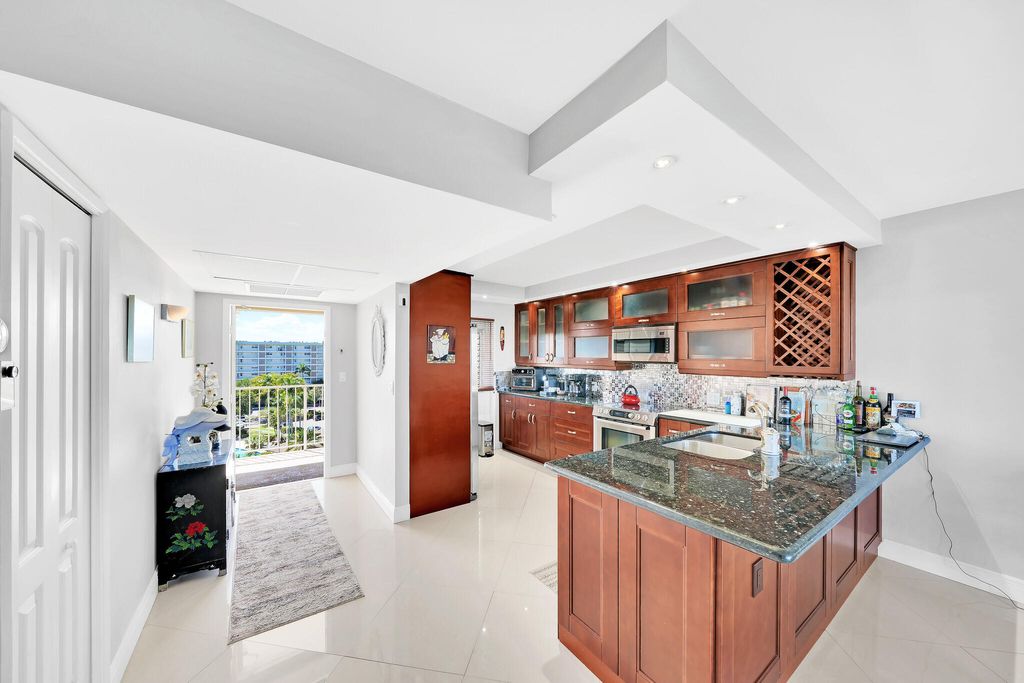 Photo of 2940 N Course Drive #811, Pompano Beach, FL 33069 (MLS # R11125397)