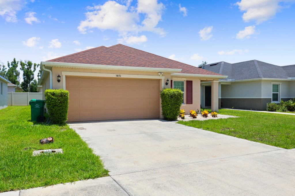 Photo of 5870 NW Pine Trail Circle, Port Saint Lucie, FL 34983 (MLS # B26031371)