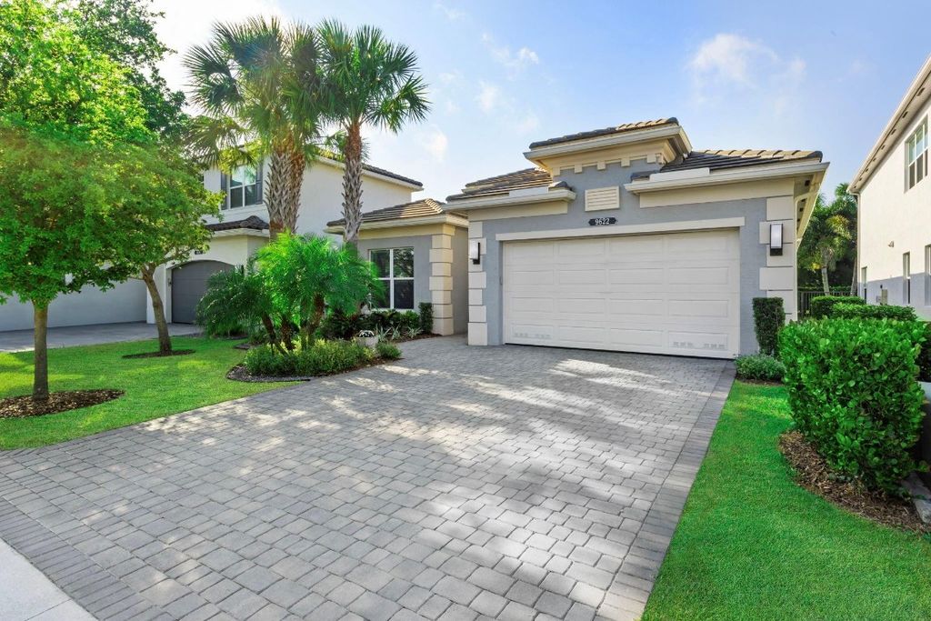 Photo of 9622 Sterling Shores Street, Delray Beach, FL 33446 (MLS # F10430058)