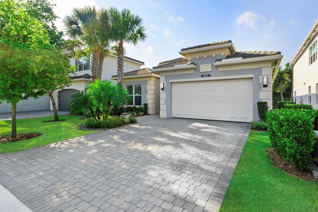 Photo of 9622 Sterling Shores Street, Delray Beach, FL 33446 (MLS # F10430058)