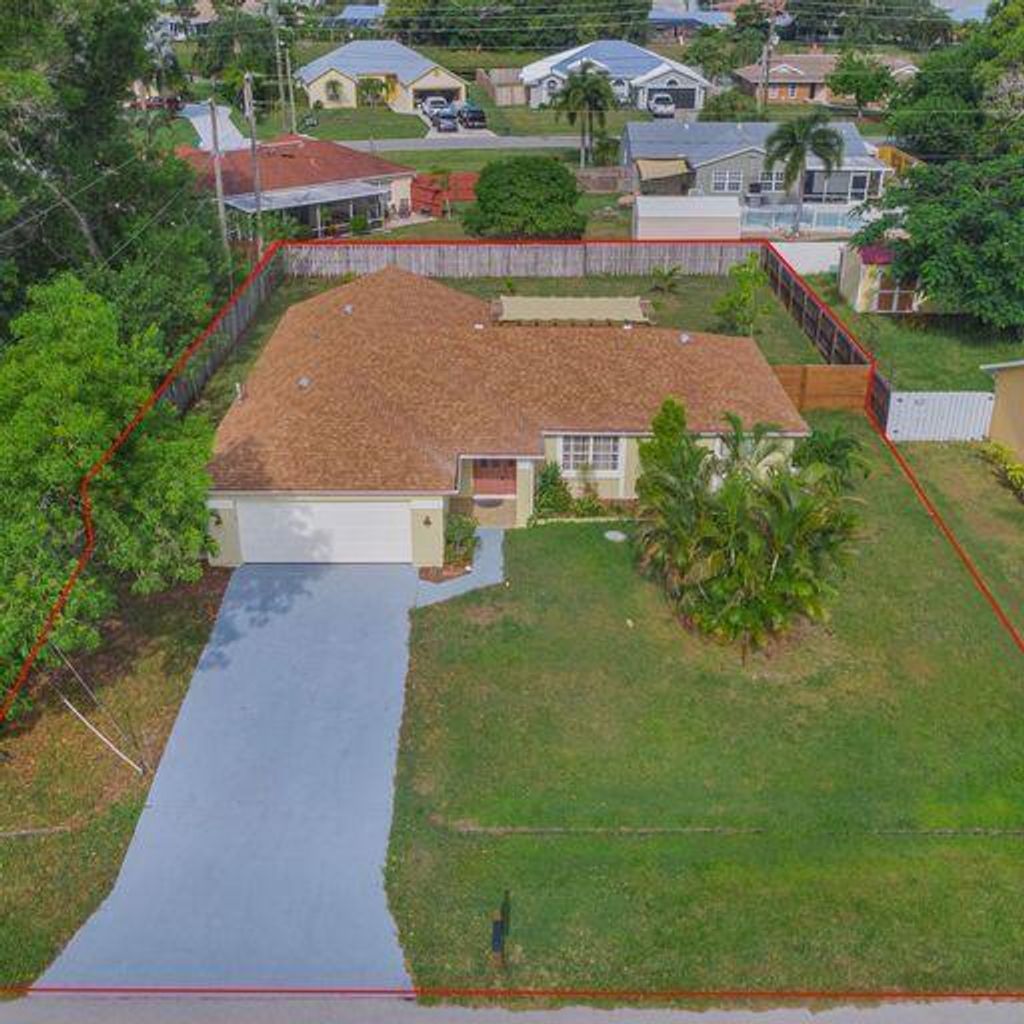 Photo of 2586 SE Rock Springs Drive, Port St Lucie, FL 34952 (MLS # R10897884)