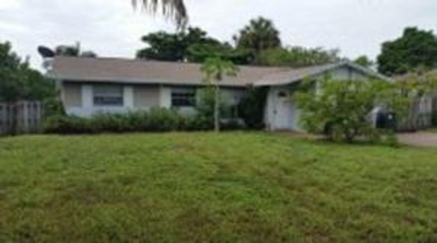 Location! Location!! Location!!! This 3 Bedroom 2 Bath offers a spacious one story open floor plan with lots of potential.  This house is located in varsity Heights a desirable area with A+ Schools, Shopping, Restaurants, and close to Mizner Park in a safe Neighborhood AS IS