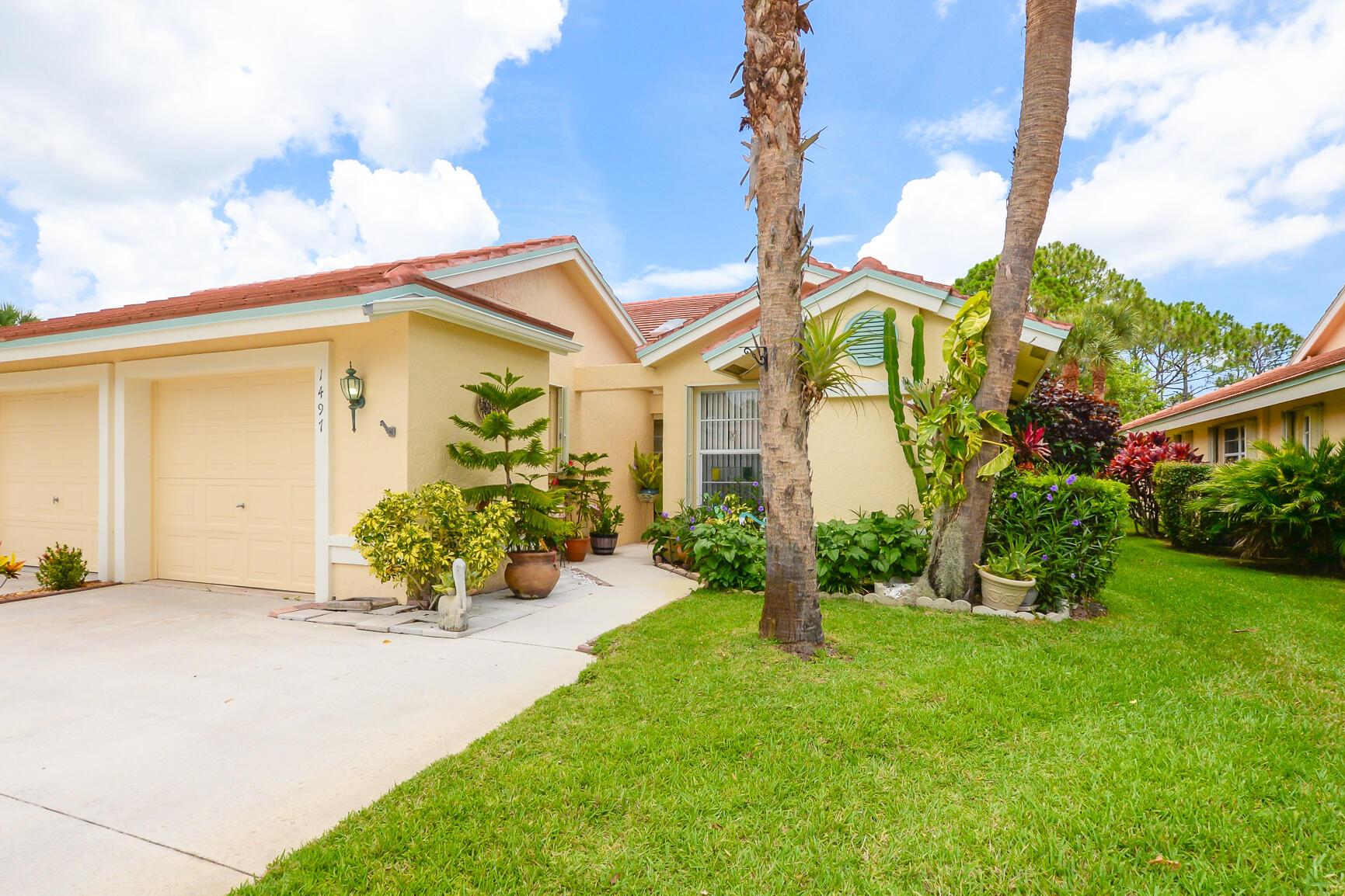 55+ Living in Palm City! This fully furnished home features a spacious screened and tiled patio overlooking a peaceful preserve--perfect for relaxing or entertaining. The living areas are finished with tile, while the bedrooms boast Berber carpeting. This model offers a roomy eat-in kitchen, a welcoming front entry, a separate laundry room, ample storage space, and a driveway that fits two cars. The oversized screened patio extends your living space into the serene outdoors.Community Amenities include a heated pool, clubhouse, and more!Check it out today!