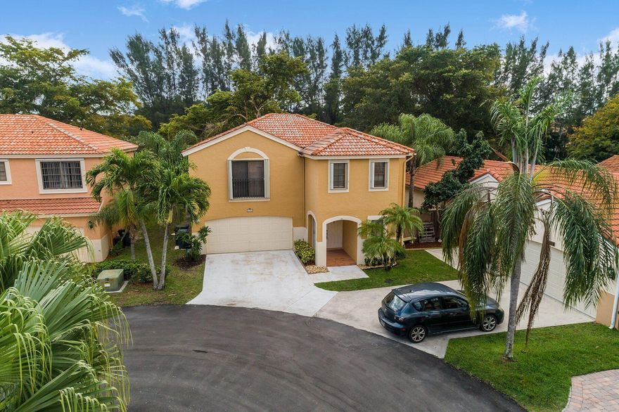 Bright and spacious home on a canal of Lake Wellington. Relaxing water views with a screened patio. Fresh paint. Tile and wood floors - no carpet! Well-maintained home near Wellington's top-rated schools, shopping, restaurants, and equestrian venues.