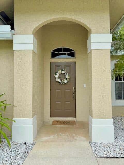 Photo of 228 PARK Road N, Royal Palm Beach, FL 33411 (MLS # B26059906)