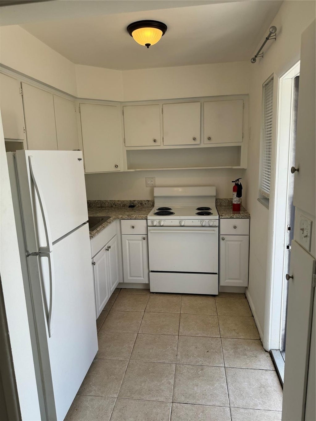 Photo of 541 NE 45th St, Boca Raton, FL 33431 (MLS # F10424052)