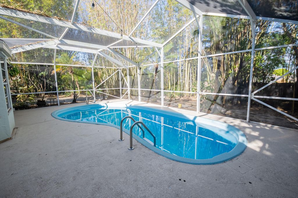 Photo of 4418 SW Farmington Street, Port Saint Lucie, FL 34953 (MLS # R11160673)