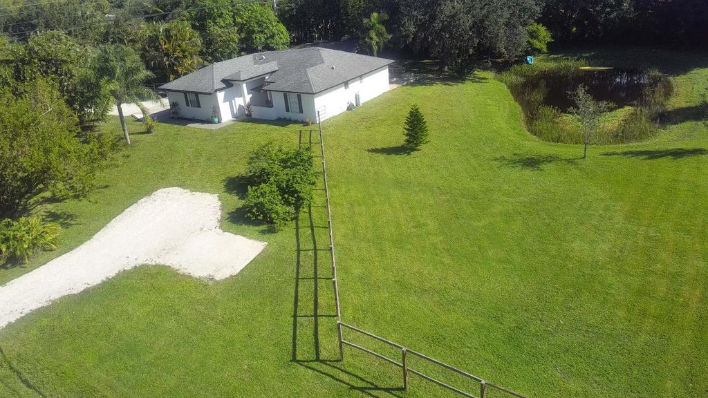 Photo of 16710 75th Avenue N, Palm Beach Gardens, FL 33418 (MLS # R11133682)