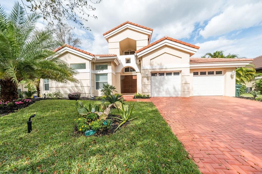 Photo of 3063 NW 60th St, Boca Raton, FL 33496 (MLS # F10423683)