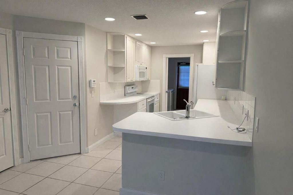 Photo of 3200 W Community Drive, Jupiter, FL 33458 (MLS # R11156464)