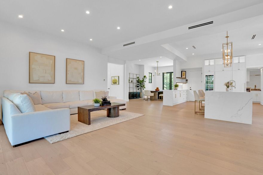 A stunning new modern residence on a high elevation with five bedrooms and office located in the desirable SoSo neighborhood. Over 7,000 square feet of indoor/outdoor space. Family rooms on both levels of this two story home. Tropical outdoor setting which includes wonderful pool/space area and loggia with summer kitchen.