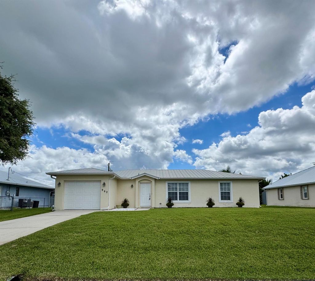 Photo of 962 SW Haleyberry Avenue, Port Saint Lucie, FL 34953 (MLS # R11127952)