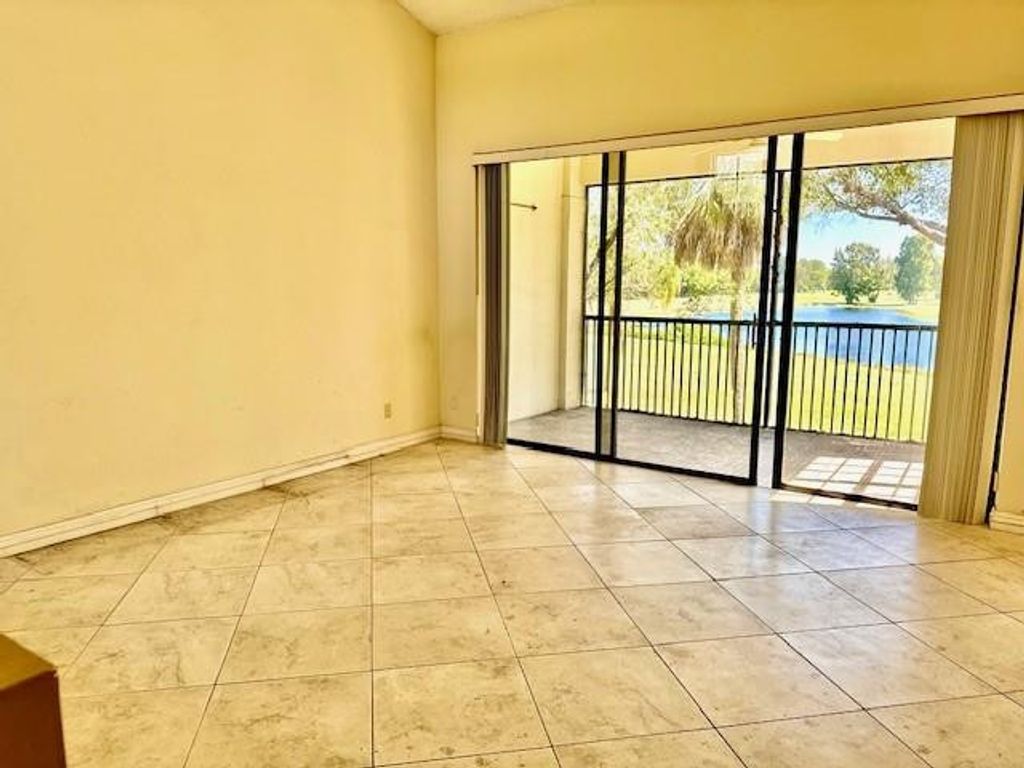 Photo of 301 SW 158th Terrace #203, Pembroke Pines, FL 33027 (MLS # F10554536)