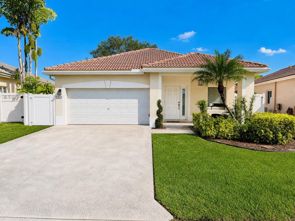 Photo of 1334 SW 44TH Terrace, Deerfield Beach, FL 33442 (MLS # B26075816)