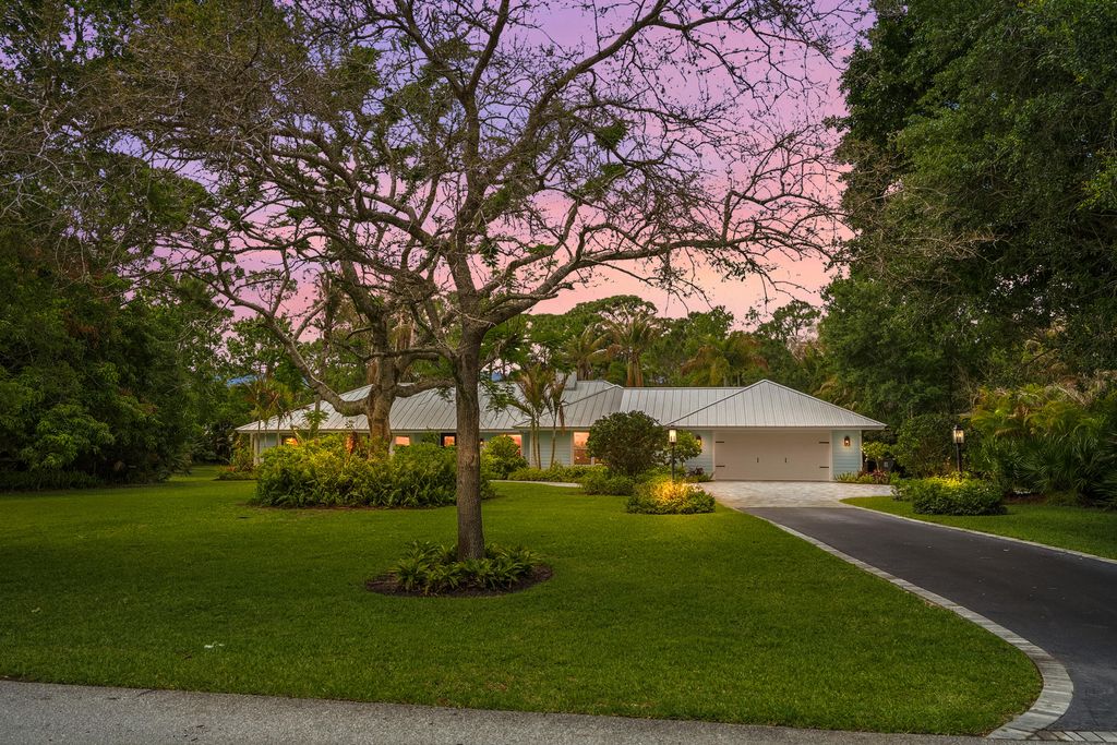 Photo of 19785 Castlewood Drive, Jupiter, FL 33458 (MLS # B26016447)