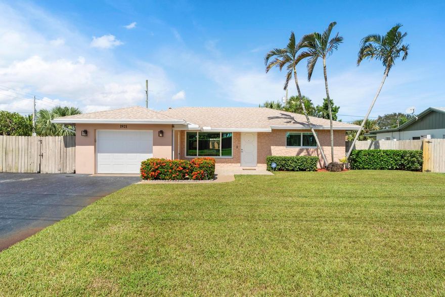 Welcome to this inviting 3 bedroom, 2 bathroom home with a 1 car garage! Enjoy added safety and peace of mind with impact windows, a roof that's only 5 years old, and wired security cameras with a DVR system. A Ring doorbell is also included for enhanced security. Inside, you'll find a beautifully remodeled kitchen featuring sleek gray cabinets with soft-close doors and drawers, a stunning backsplash, granite countertops, and newer stainless-steel appliances. All bedrooms are generously sized, with the primary bedroom offering a large closet and an updated en-suite bath with a spacious walk-in shower. Additionally, the sunroom is pre-wired for a hot tub, providing the perfect space for ultimate relaxation. Step outside to relax on the screened porch with tigerwood flooring or enjoy the open patio space by the oversized pool, equipped with a high-efficiency pool pump and a gas heater (2022). The property also includes a frame storage shed with a concrete floor and a shingle roof that matches the house, providing ample space for your storage needs. There's plenty of room for an RV or boat, making this home a perfect blend of comfort, convenience, and security to suit your lifestyle.