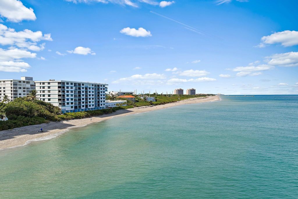 Photo of 900 Ocean Drive #106, Juno Beach, FL 33408 (MLS # B26039640)