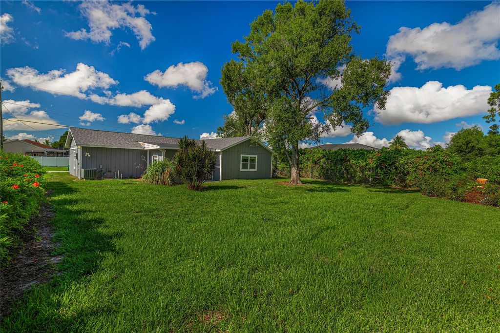 Photo of 1809 SW Capehart Avenue, Port Saint Lucie, FL 34953 (MLS # F10530731)