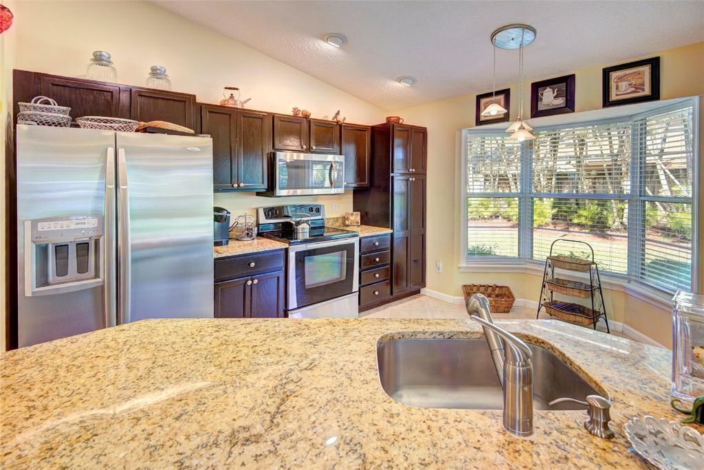 Photo of 114 Sand Pine Way, Royal Palm Beach, FL 33411 (MLS # F10541780)