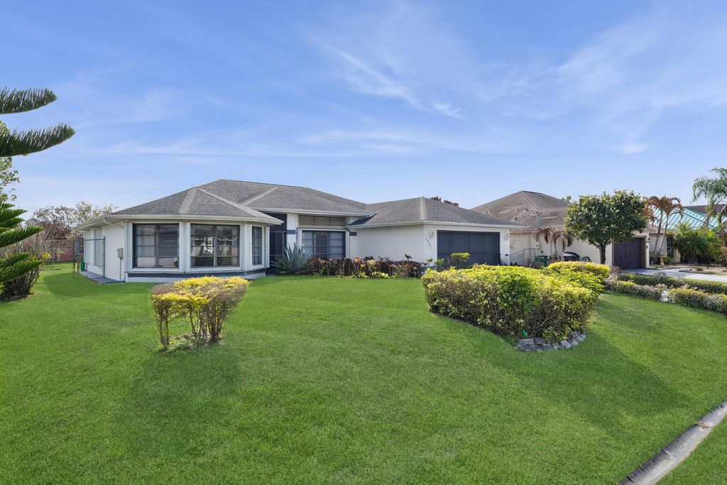 Photo of 1741 SW Ardmore Street, Port Saint Lucie, FL 34953 (MLS # B26005018)