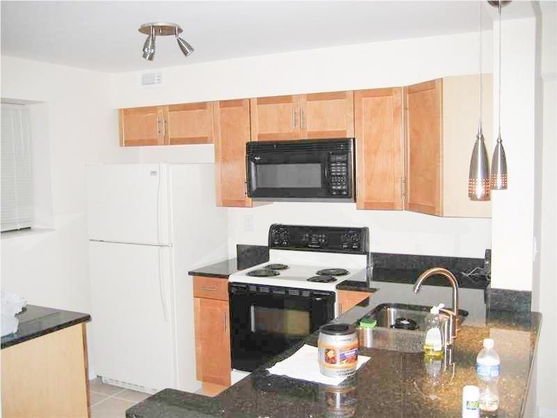 GARDENS NORTH 9 CONDO - Residential Lease