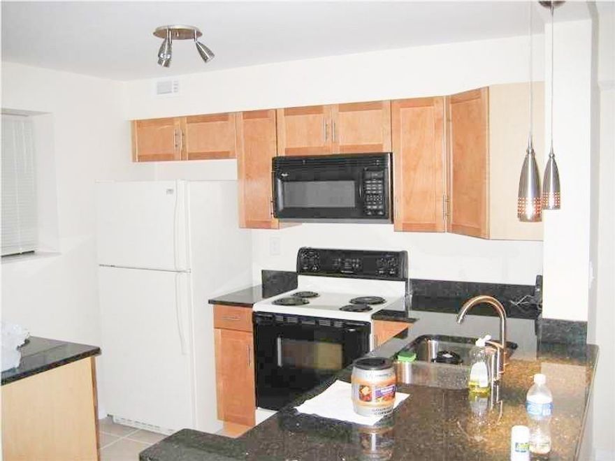 Totally upgraded unit with granite counter tops, tile floors and much more.