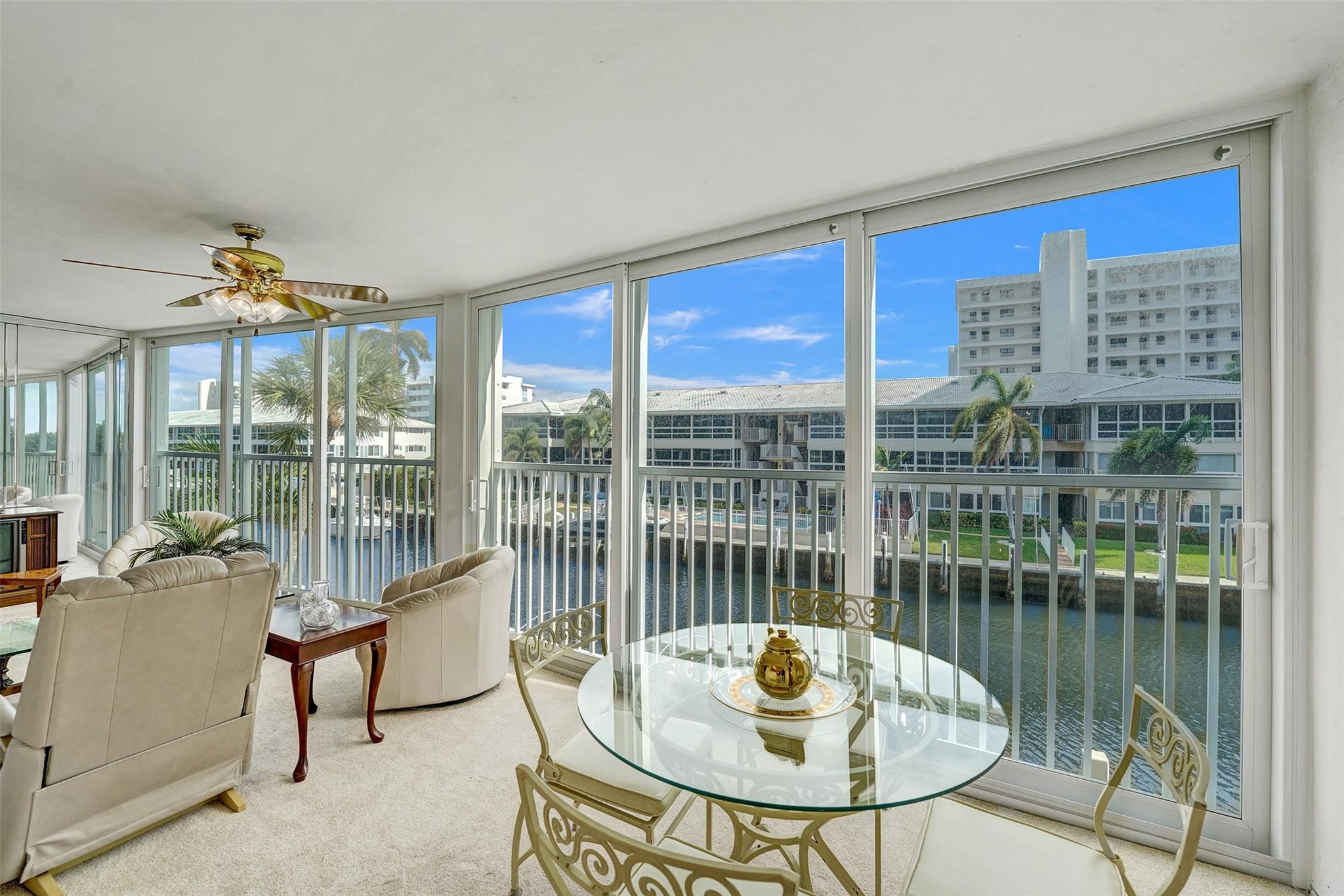 50 YEAR CERTIFICATION COMPLETE & RESERVES ARE FULLY FUNDED! ONLY UNIT PRESENTLY FOR SALE IN DESIRABLE WILSHIRE EAST W/ A TOTAL OF 1607 SQ FT. ( TAX ROLLS NOT ACCURATE, SEE FLOOR PLAN IN PHOTOS). LIGHT & BRIGHT UNIT W/ WALL OF IMPACT GLASS SLIDING DOORS ALONG THE ENTIRE NORTH SIDE OF UNIT OVERLOOKING CANAL & INTRACOASTAL. BOATERS DREAM; OWNERS DOCK UP TO 55 FT BOAT W/ DOCKAGE FEE OF $5.00 PER FT PER MONTH & DOCKAGE AVAILABLE NOW. UNDER COVER PARKING W/ 1 ASSIGNED SPACE & GENEROUS GUEST PARKING.
WASHER/DRYER IN UNIT. MINUTES TO BEACH, SHOPPING, FINE DINING. STORAGE LOCKER, BIKE STORAGE. FRONT WINDOWS ARE NOT IMPACT. HEATED POOL & COMMUNITY ROOM W/ FULL KITCHEN. NO RENTING THE 1st 2 YEARS. ALL ASSESSMENTS PAID IN FULL. UNIT IS IN ORIGINAL CONDITION; BUT VERY NEAT & CLEAN.
