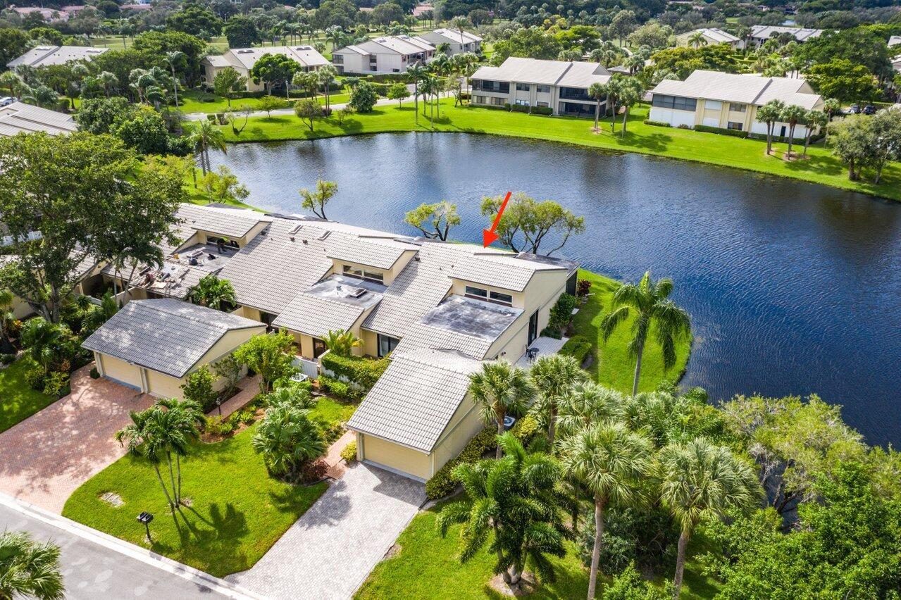 *PRICED TO SELL!* Discover unparalleled privacy and panoramic water views from this bright and airy, impeccably maintained 2-bedroom corner villa in Eastgate at Hunters Run Country Club. This ideally located residence offers peace and tranquility with its east-west orientation. Enjoy sunrise and morning coffee on the front patio, and unwind with sunset drinks with friends on the screened lanai. Other highlights include contemporary fixtures & tasteful hardware updates, expansive vaulted ceilings, hurricane-impact windows, a 1.5-car garage, new roof installed in 2024 and much more. This exceptional villa is a rare find for the discerning buyer and ensures hassle-free living at an unbeatable price for private club living. Furniture and furnishings are negotiable!